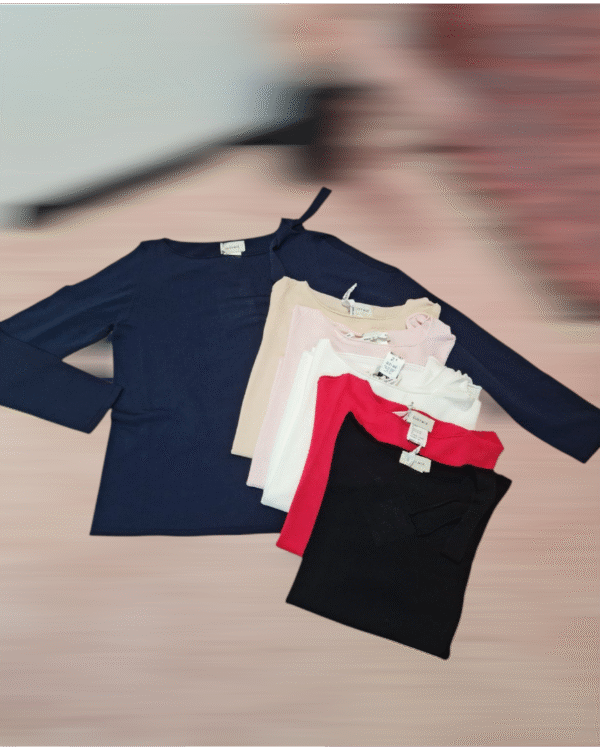Maglia SUSYMIX con fiocco sulla spalla & "oblò"